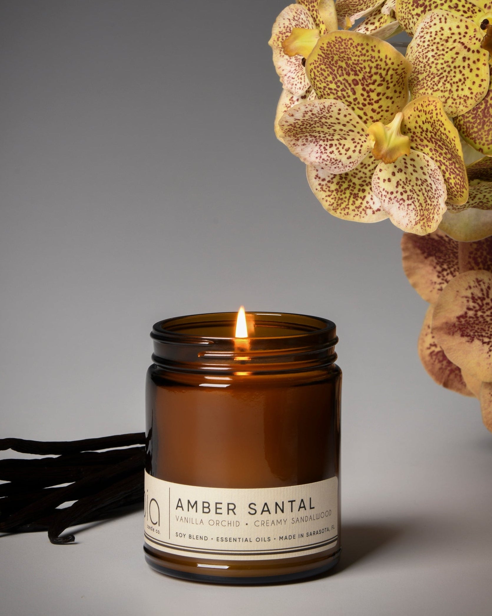 amber santal classic candle, vanilla, orchid bia candle amber glass made in usa