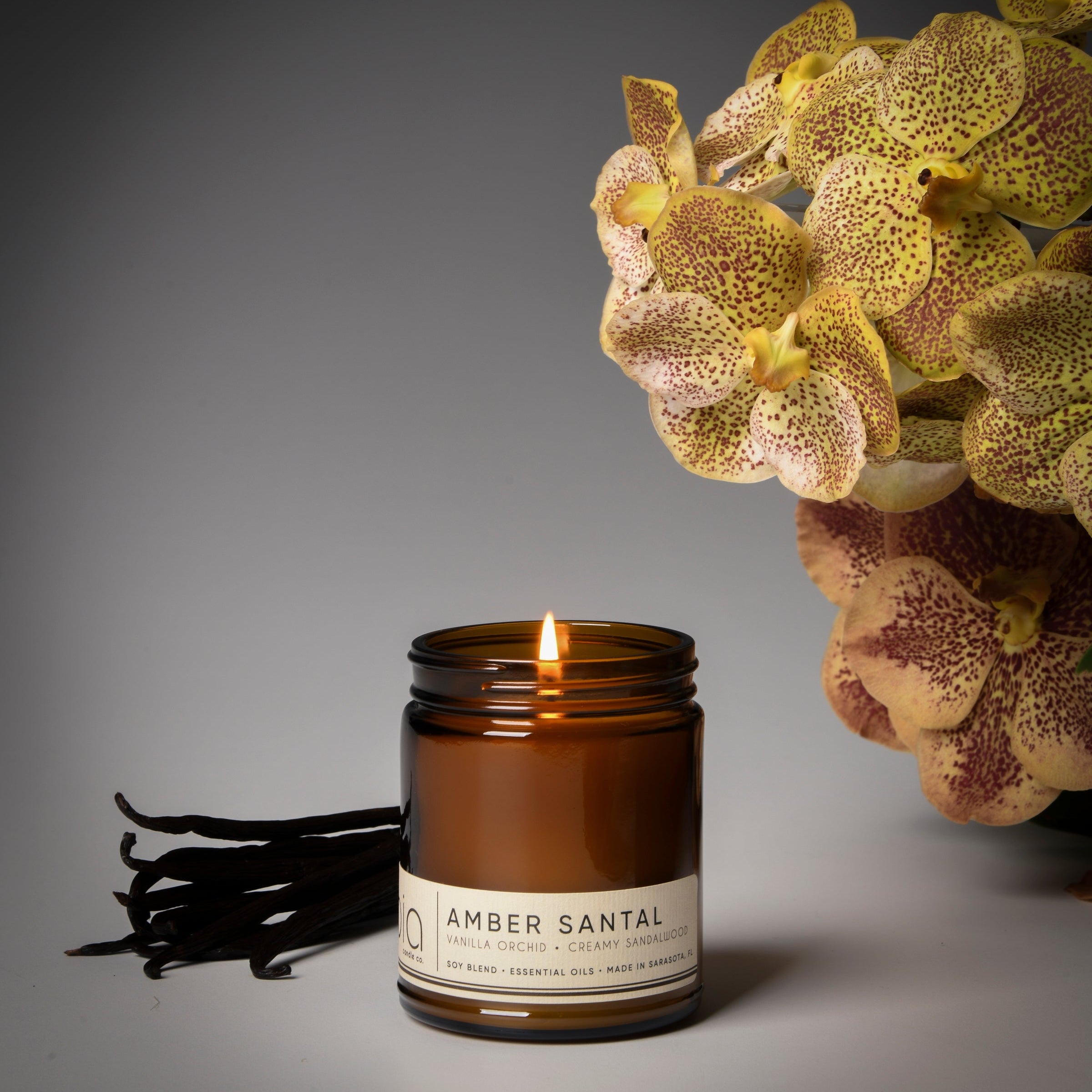 amber santal classic candle, vanilla, orchid