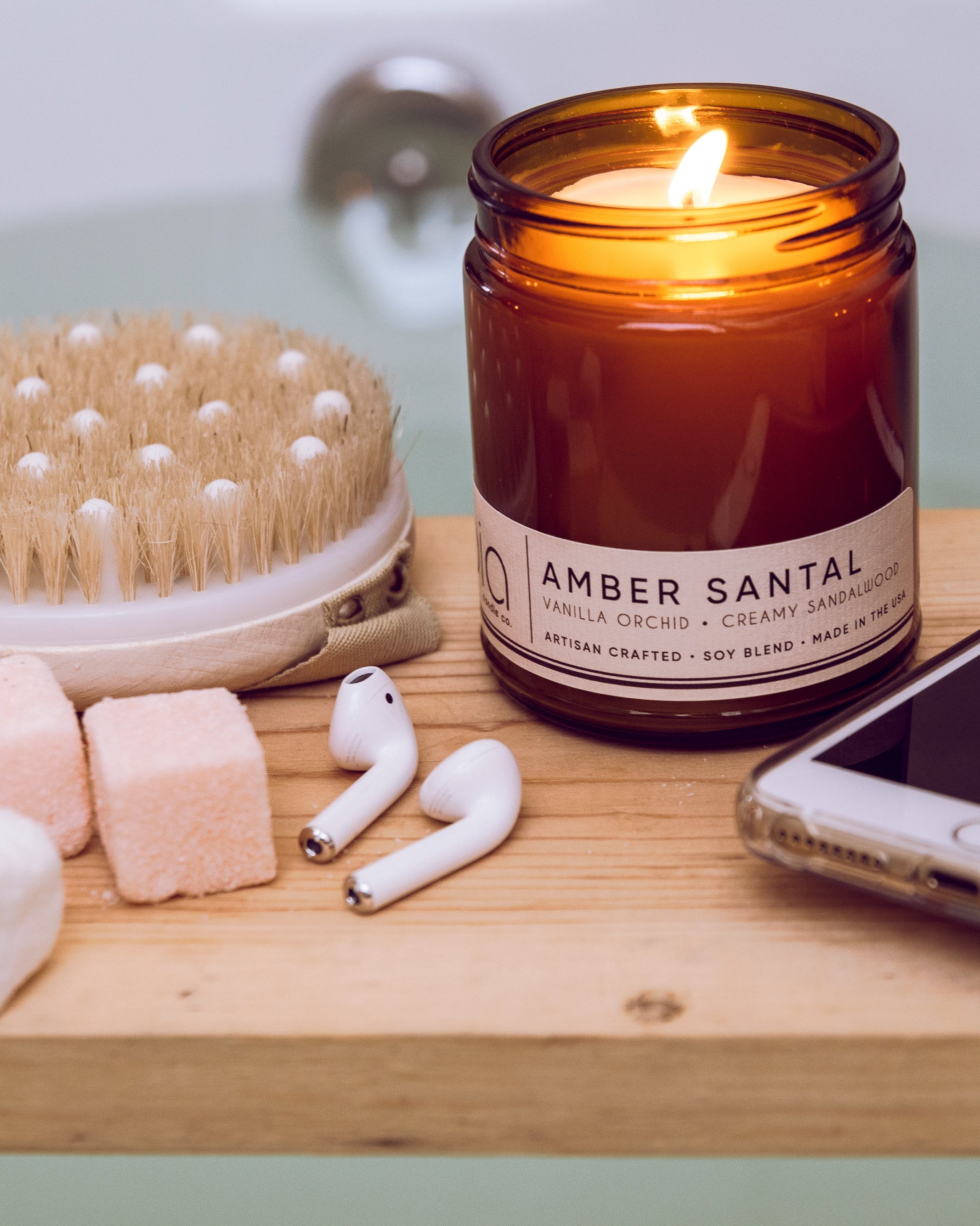 amber santal lifestyle with bath, for relaxing evening, sponge, ear pods, iphone