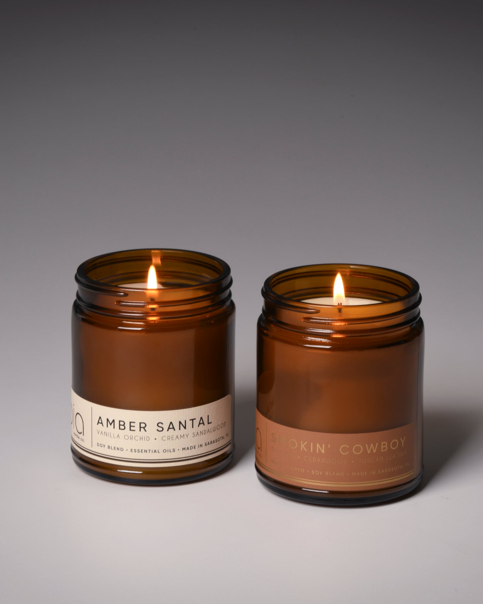 our best sellers duo, amber santal and smokin' cowboy