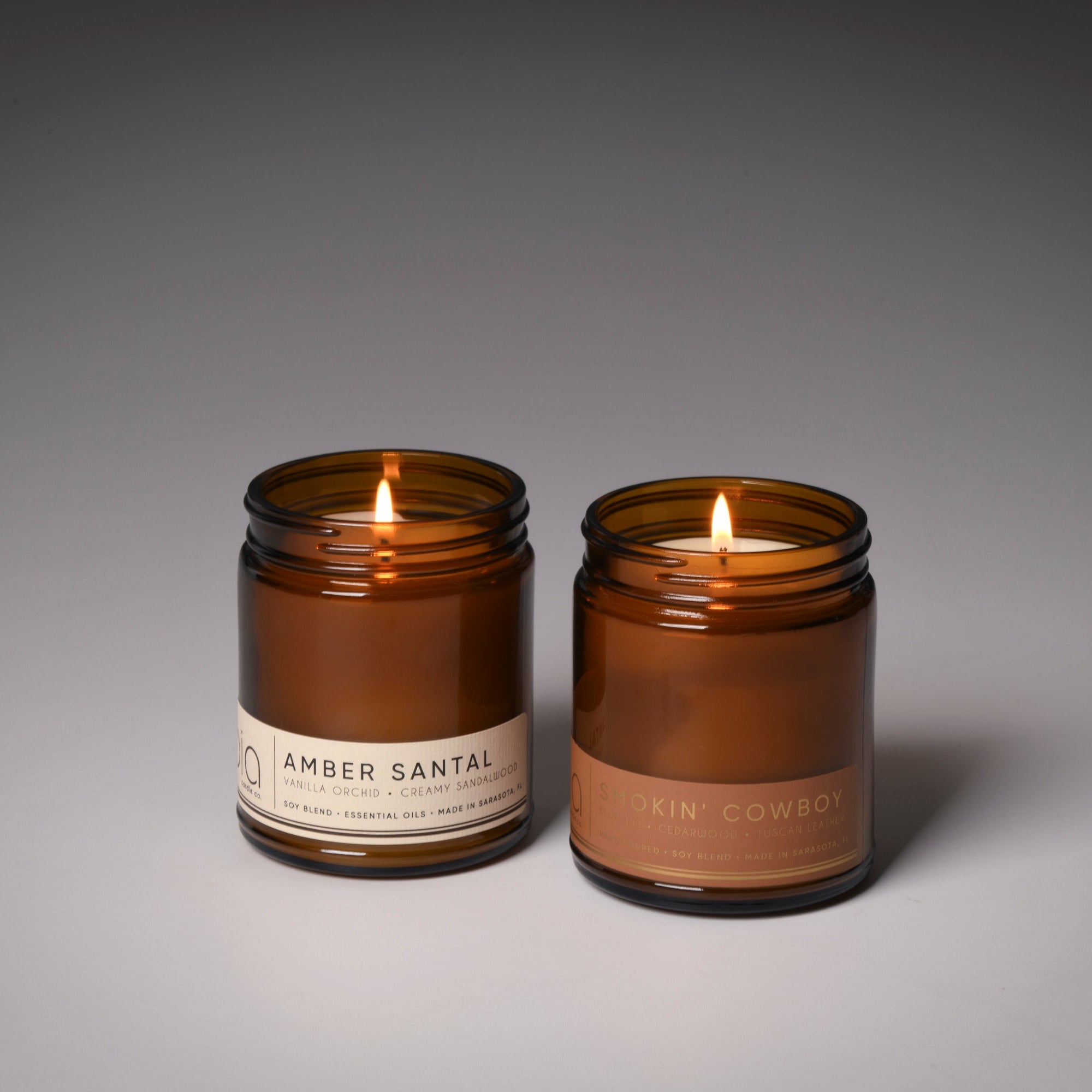 our best sellers duo, amber santal and smokin' cowboy