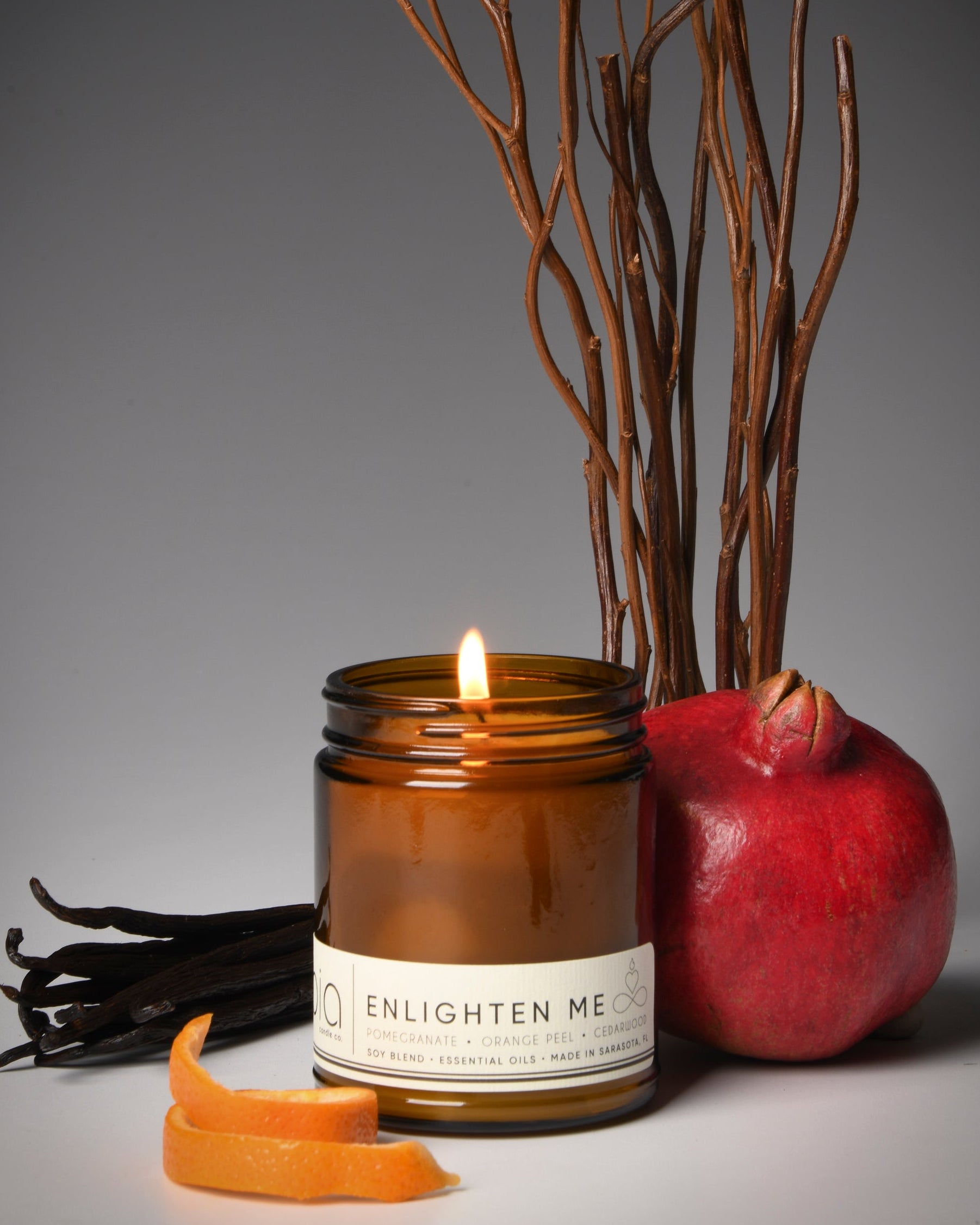 enlighten me classic candle, pomegranate, orange peel, vanilla
