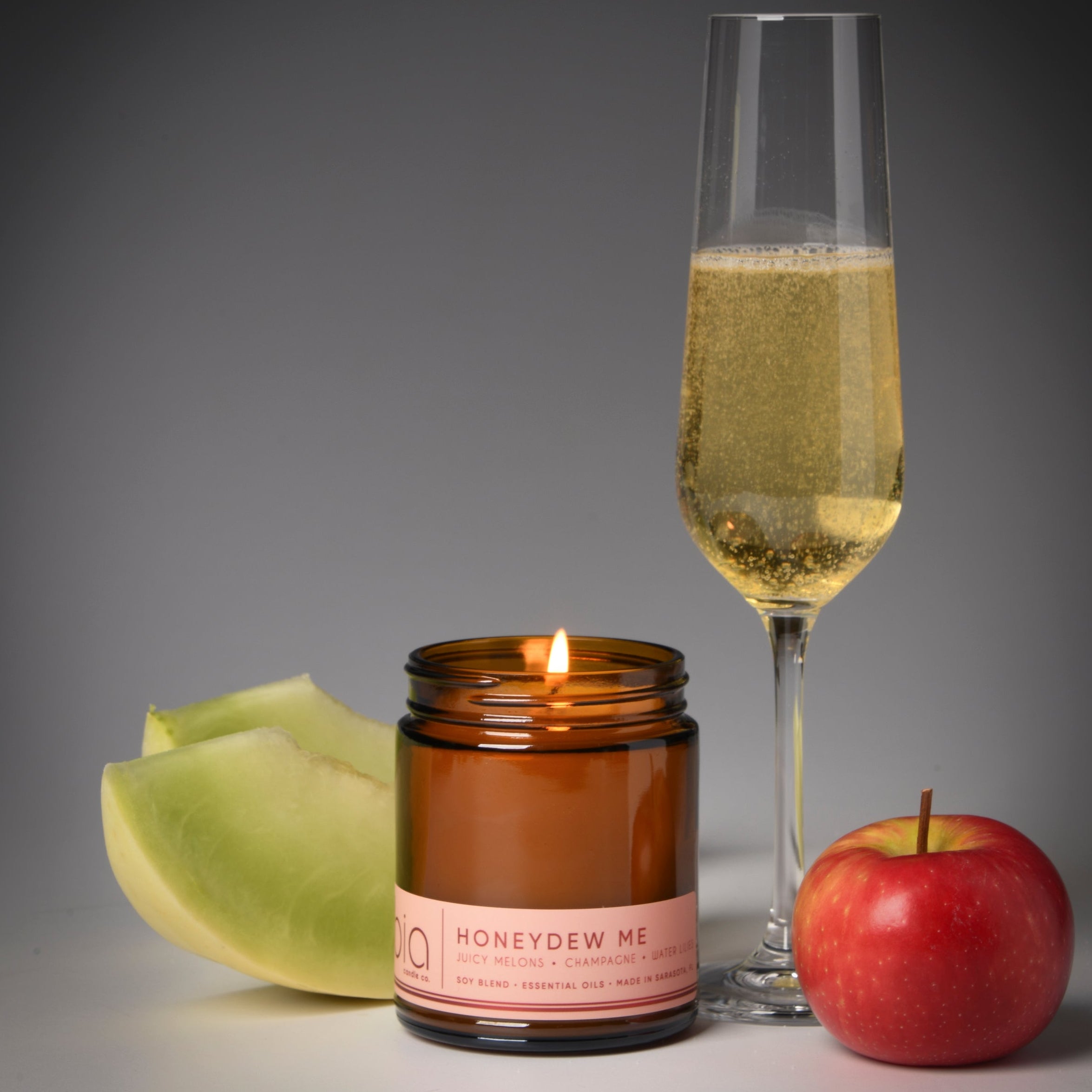 honeydew me candle, champagne, melon, apple
