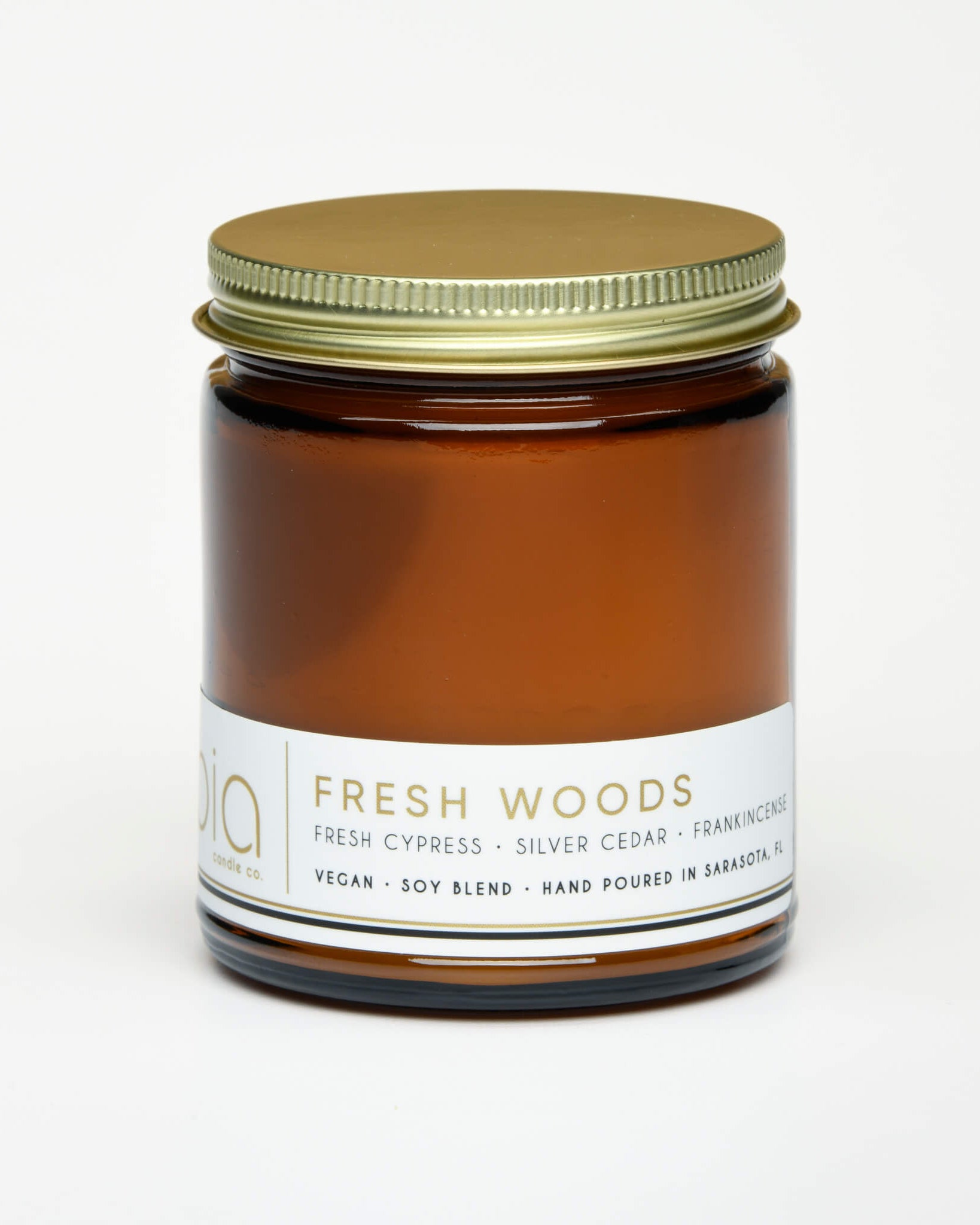 fresh woods classic candle with lid on