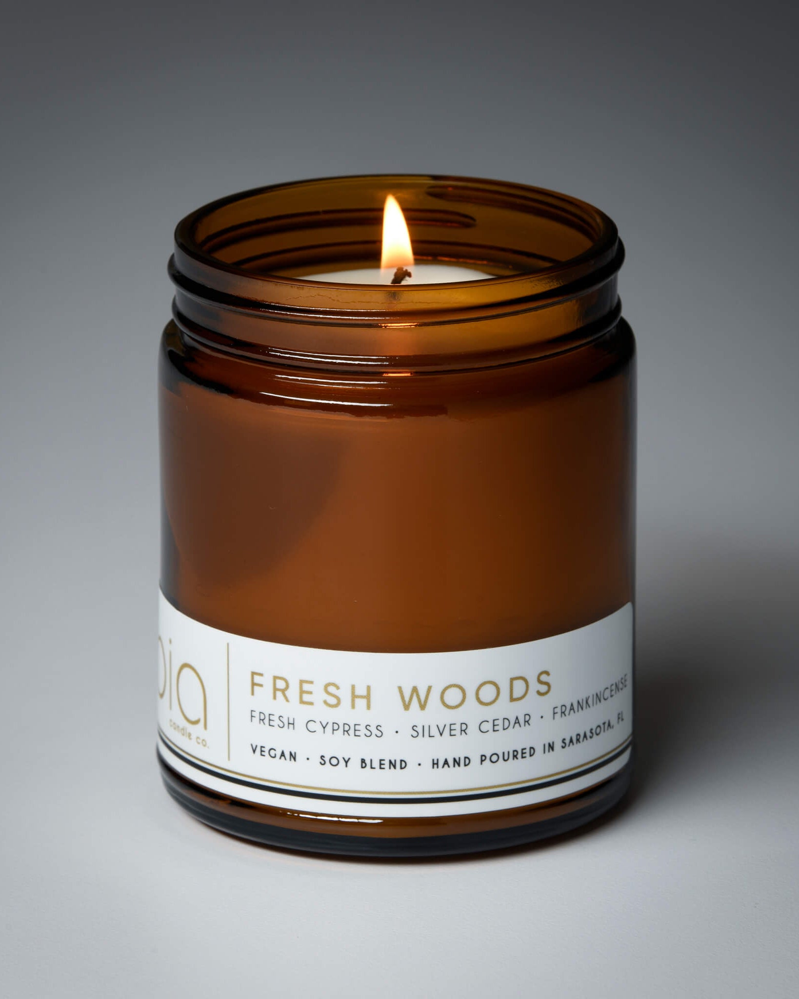 fresh woods classic candle wick lit