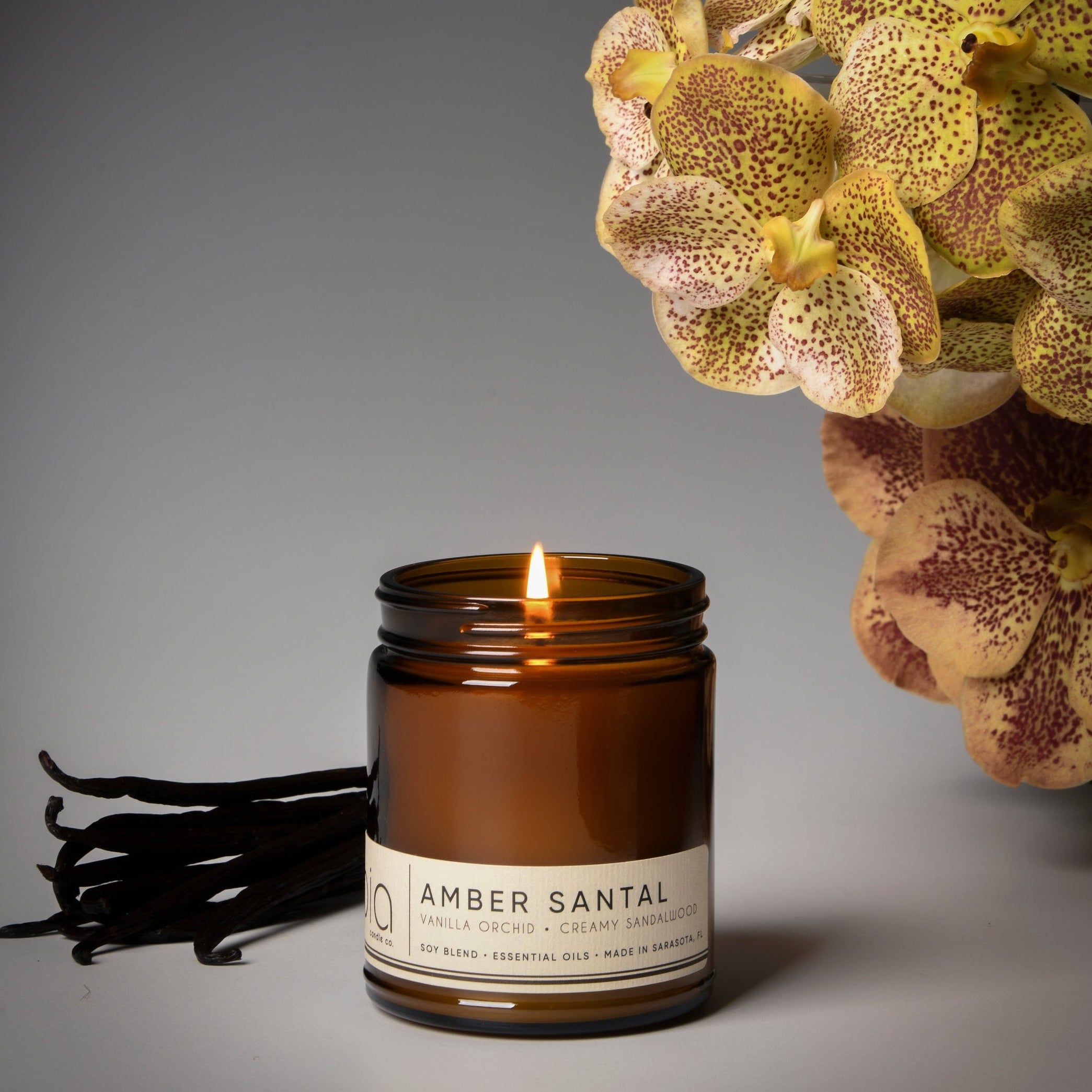 amber santal classic candle, vanilla, orchid bia candle amber glass made in usa