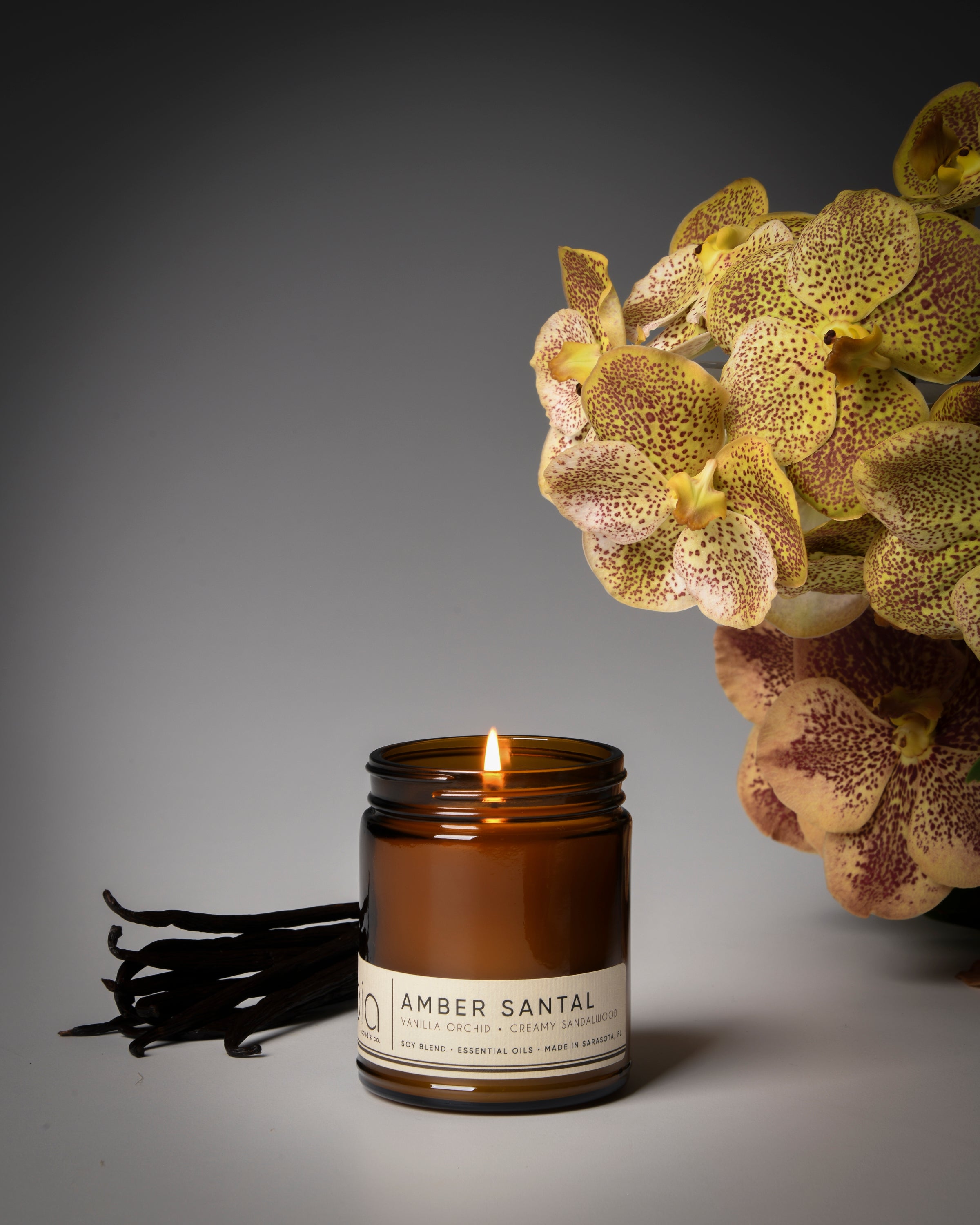 amber santal classic candle, vanilla, orchid