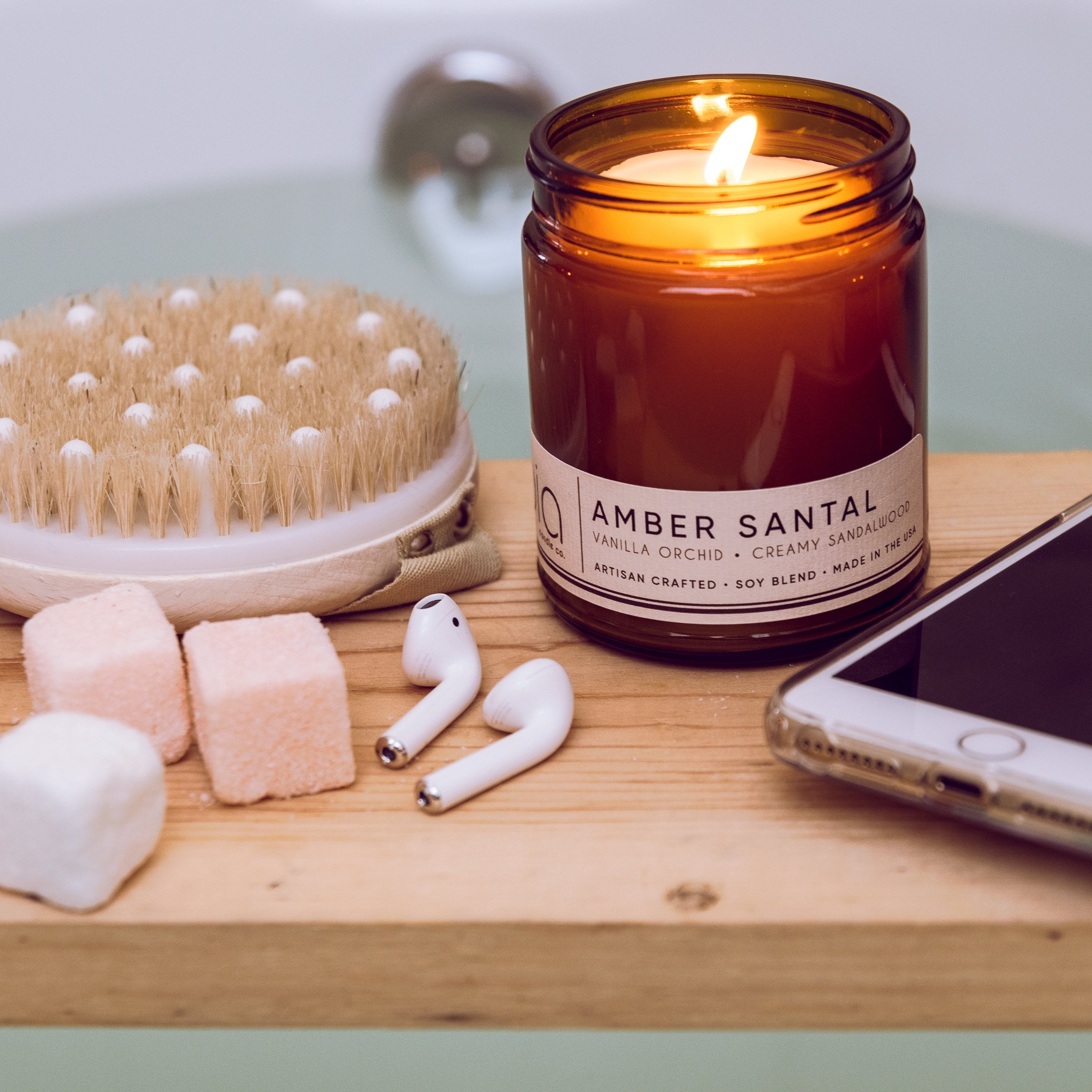 amber santal lifestyle with bath, for relaxing evening, sponge, ear pods, iphone