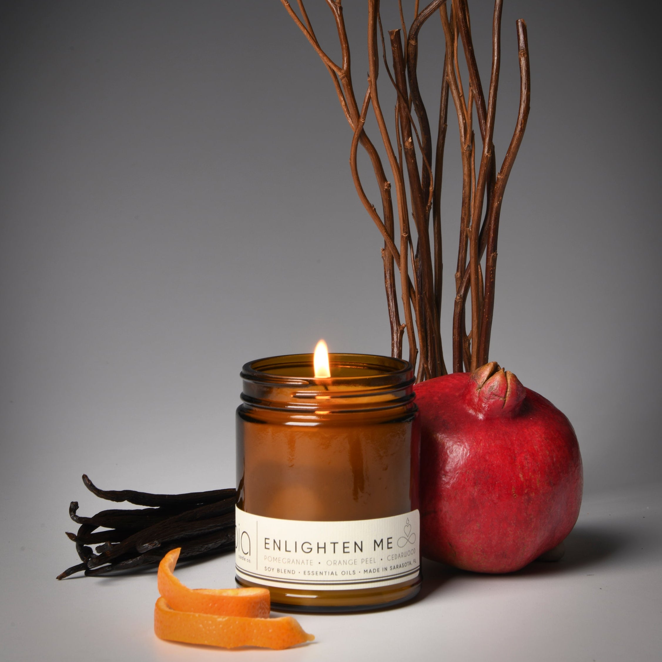 enlighten me classic candle, pomegranate, orange peel, vanilla