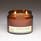 pistachio coconut grande two-wick candle lit