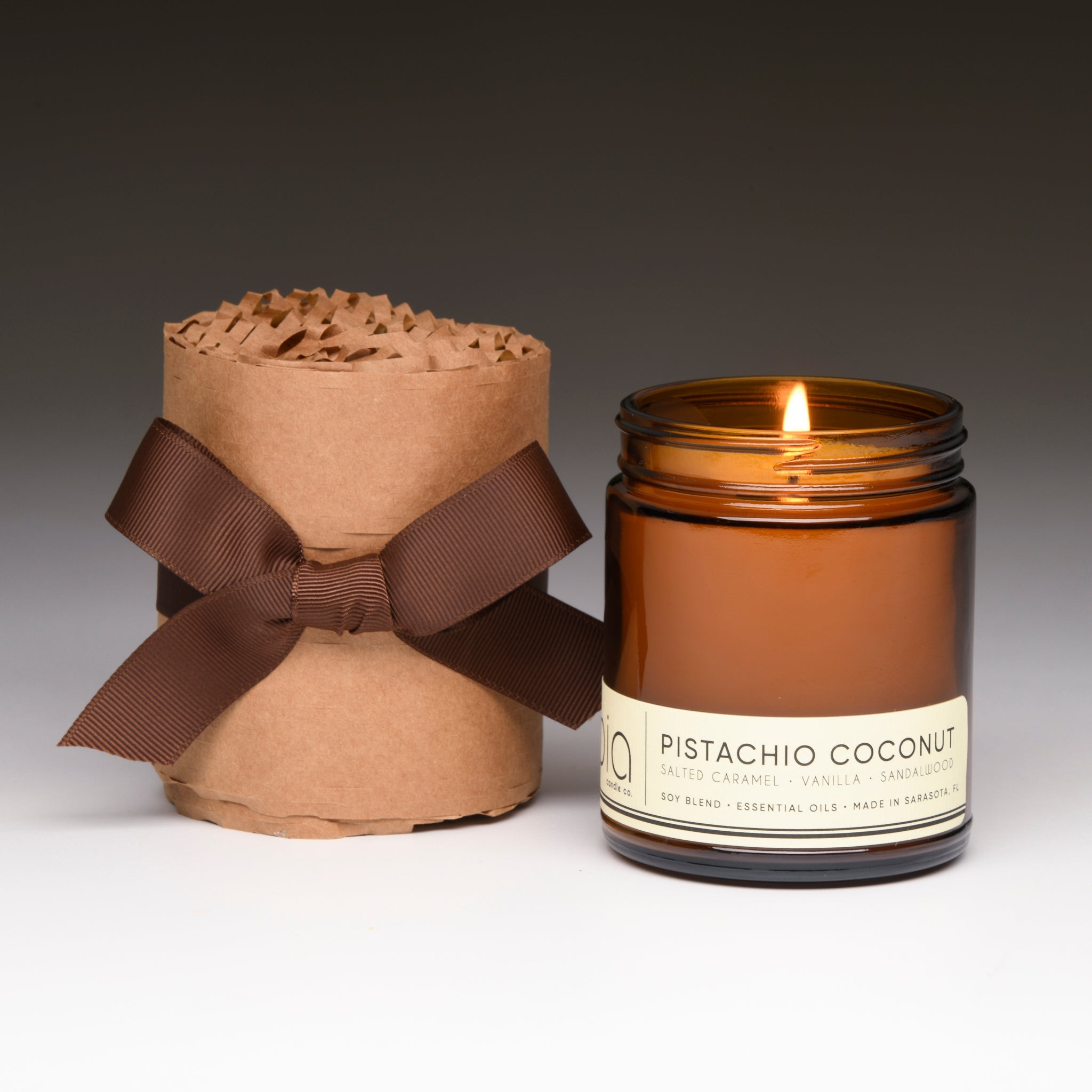 pistachio coconut candle classic lit with gift wrap