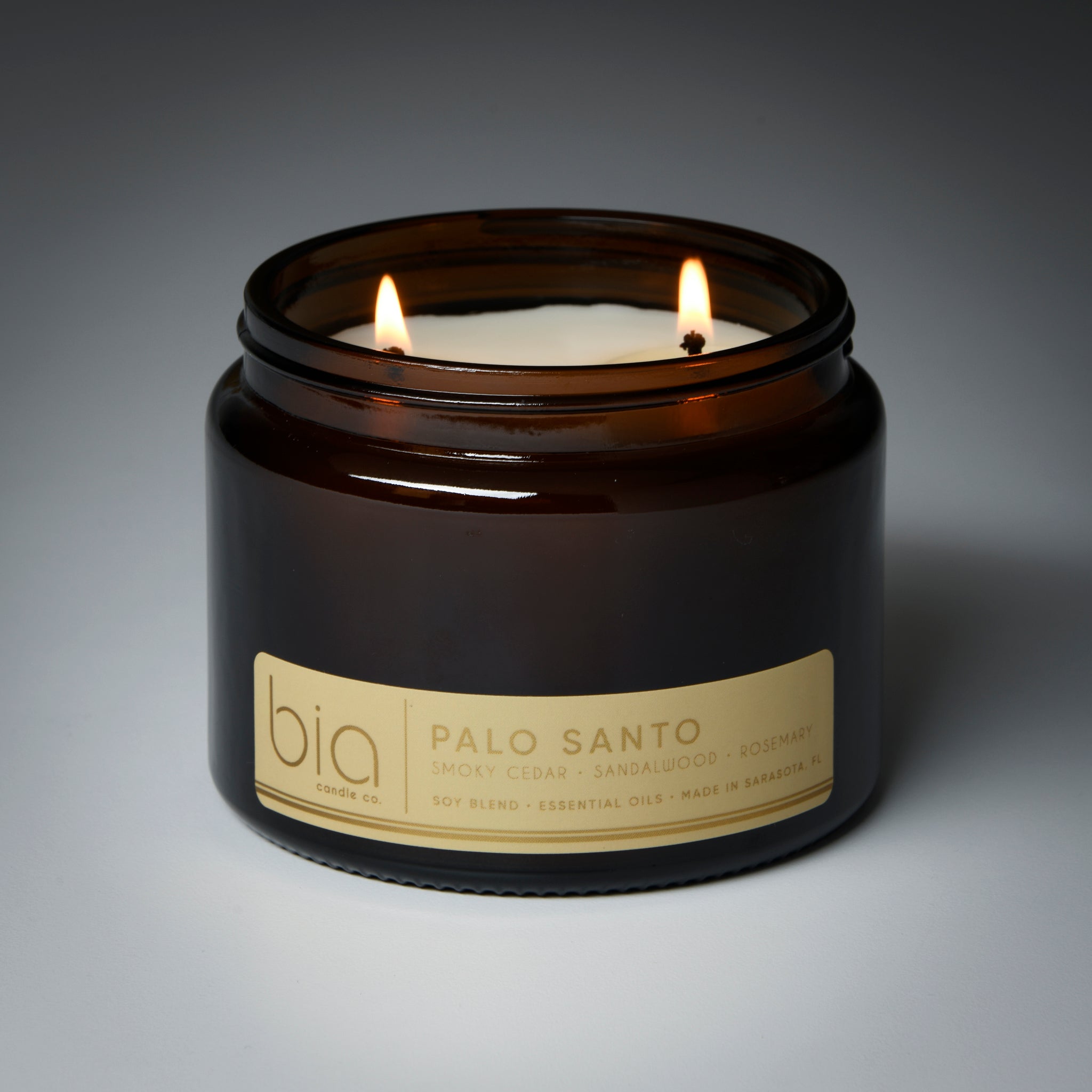 palo santo candle grande two wick with wicks lit
